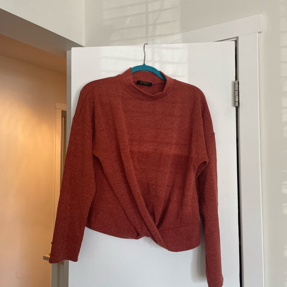 Orange cross front sweater